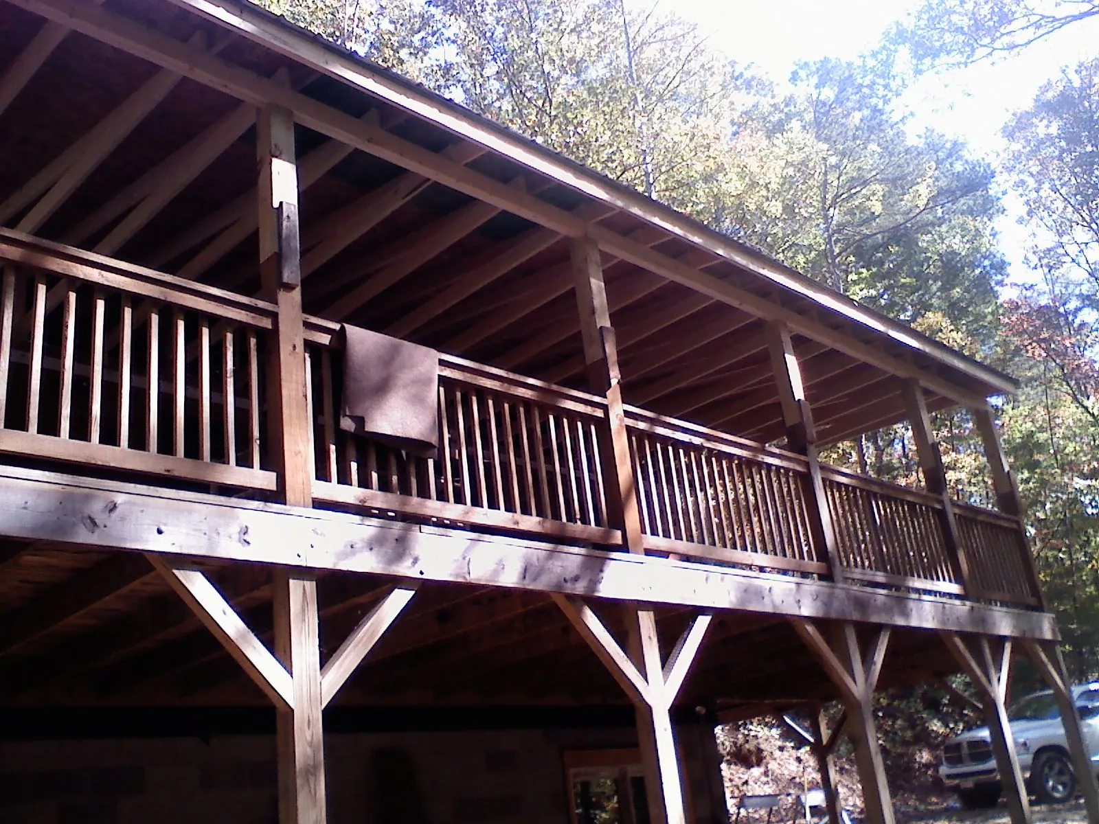 Timber framing under a new elevated porch and deck — Roof Leak Repair in Ogden by Roofing Brothers